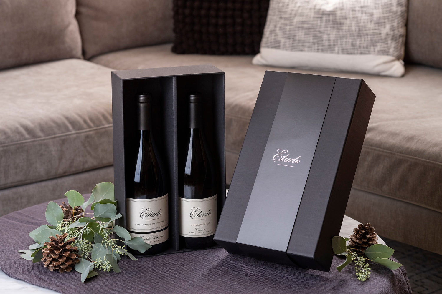 Two bottles of Etude Chardonnay and Pinot Noir in a black gift box.
