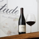 Bottle of Etude Pinot Noir wine and a glass