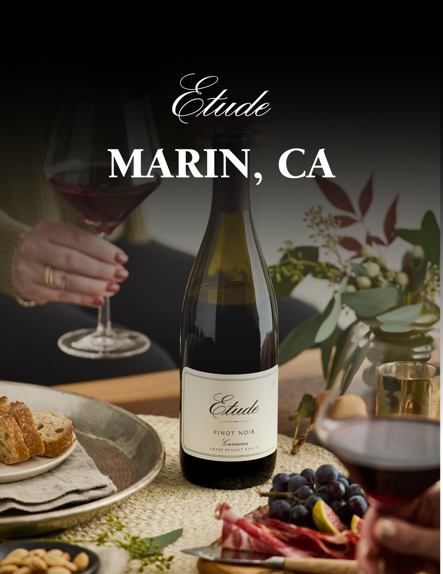 Etude Pinot Noir wine bottle on table with glasses